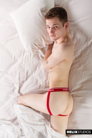 Sexy twink Danny Nelson wakes up with the contents of his red hot jockstrap pointing north and needing a raunchy release. 19