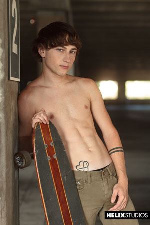 Sexy boy Cole Claire is working up a sweat in the parking garage trying out some new tricks on his board 12